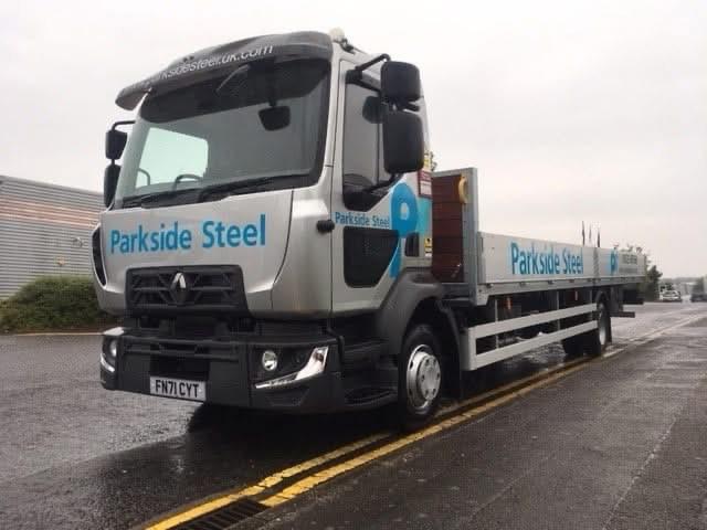 Parkside Steel 12-tonne Renault flatbed lorry in branded livery, parked outside the Sherwood Park facility