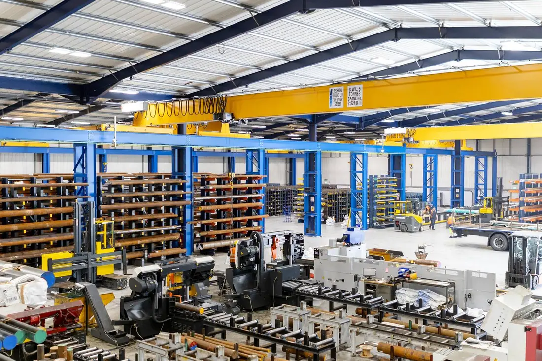 Parkside Steel Sherwood Park facility — full warehouse overview showing saw floor, cantilever racking and 5-tonne overhead crane